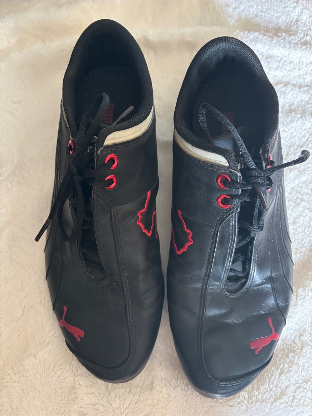 Puma Black Sneakers with Red Accents and White Trim